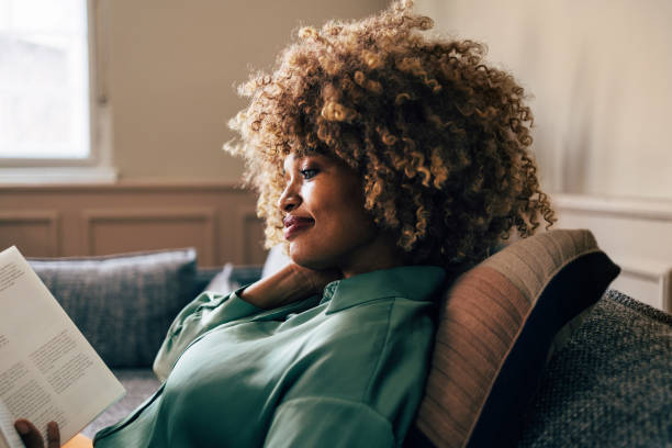 istock A Happy Beautiful Woman Relaxing At Home 1487069656