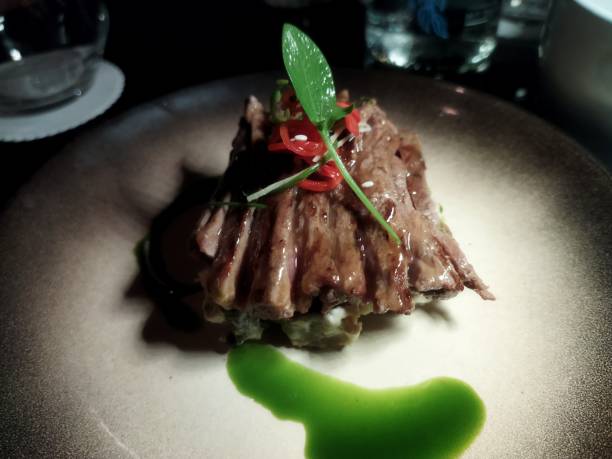 istock Sirloin beef wagyu with green sauce and rice 1487071079