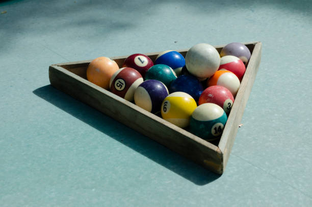 istock Balls for billiards in a triangle pyramid, billiard pool table, photo 1487071387