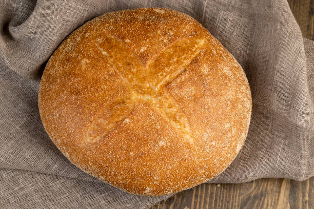 istock A whole loaf of round-shaped wheat bread 1487072571