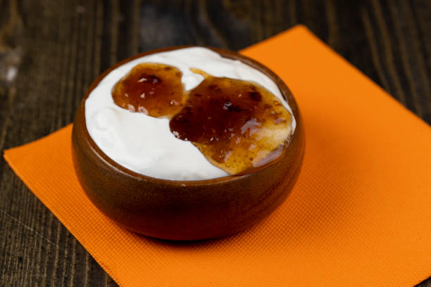 istock natural white milk yogurt with the addition of fig jam 1487073230