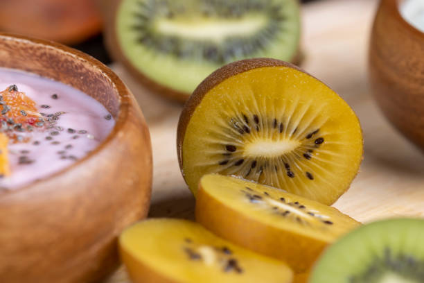istock green and yellow kiwi fruit cut into pieces, close up 1487074964