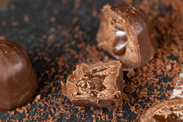 istock sweet chocolates with soft filling, chocolate pieces 1487075120