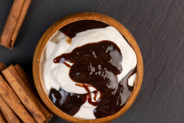 istock Fresh Yogurt with added chocolate for chocolate flavor 1487075643