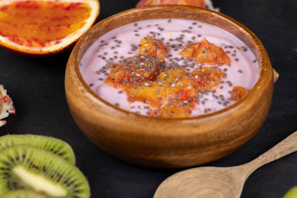 istock fresh yogurt with berries and fruits with red oranges 1487075685