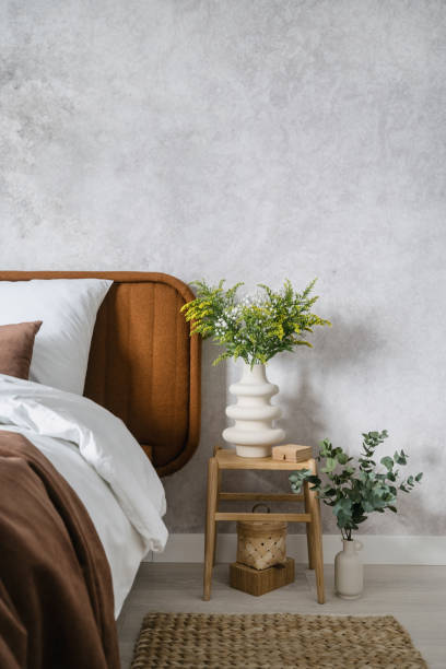 istock apartment with stylish decor and green eucalyptus branch in ceramic vase 1487076312