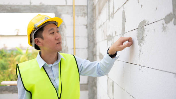istock An Asian Engineering man wearing safety helmet checking construction site analyzing about project progress 1487079834