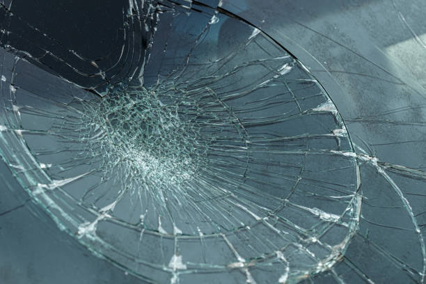 istock Broken glass of vehicle windscreen after traffic accident 1487086295