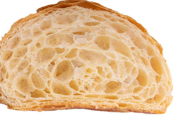 istock French croissant cut isolated on white background 1487093038