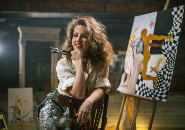 istock young female artist working in her studio 1487095237