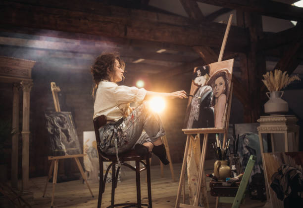 istock young female artist working in her studio 1487095395