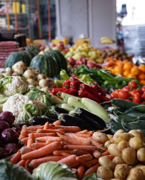 istock Fruit market with various colorful fresh fruits and vegetables. 1487098782