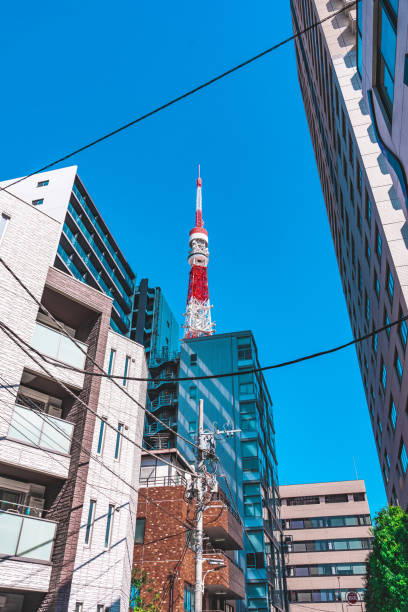 Electric high voltage tower tokyo Tokyo tower locate on the street in tokyo city low angle street japan stock pictures, royalty-free photos & images