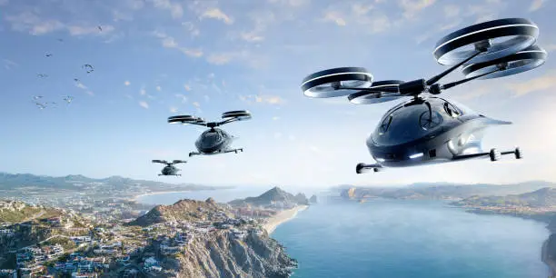 Photo of eVTOL Aircraft Flying Over Coastal Location