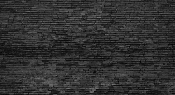 istock brick wall background texture old black pattern dark wallpaper grunge blank for design 1487104821