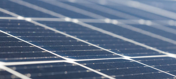 istock Solar cell panels close view - eco-conscious energy. Banner copy space. 1487106266