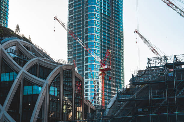 istock Construction with cranes in Tokyo City 1487109530