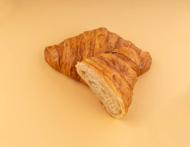 istock One plain croissant and half cut croissant 1487111279