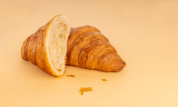 istock One plain croissant and half cut croissant 1487111289