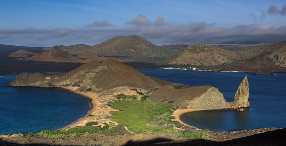 Bartolome Island, the Pinnacle Rock and the Sulivan Bay lava flow on James Island. Galapagos Islands, Ecuador.