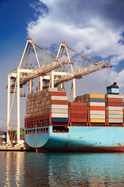 istock Container ship is waiting to load at cargo port 1487113771