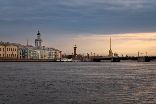 View of the Neva River, University Embankment, the Kunstkamera building, Peter and Paul Fortress and the Palace Bridge on a spring morning, St. Petersburg, Russia