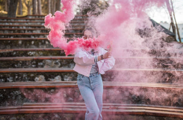 istock A happy woman has crazy fun in the park 1487117695