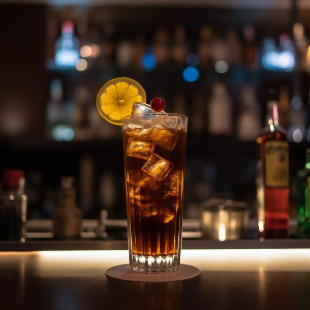istock a tall glass with a lime garnish is sitting on the bar 1487117712