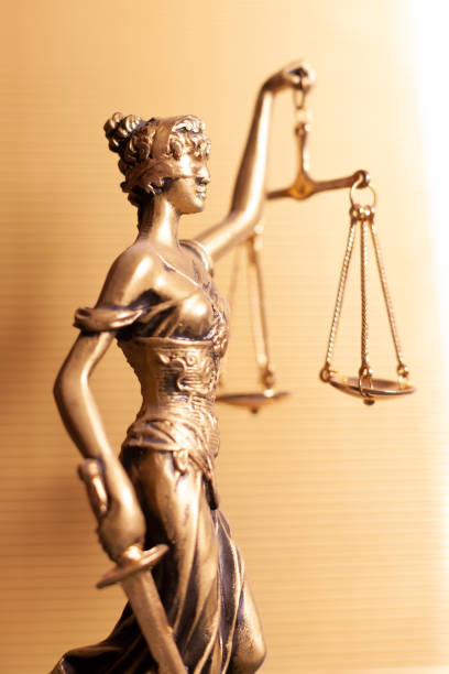 lady justice on gold background stock photo