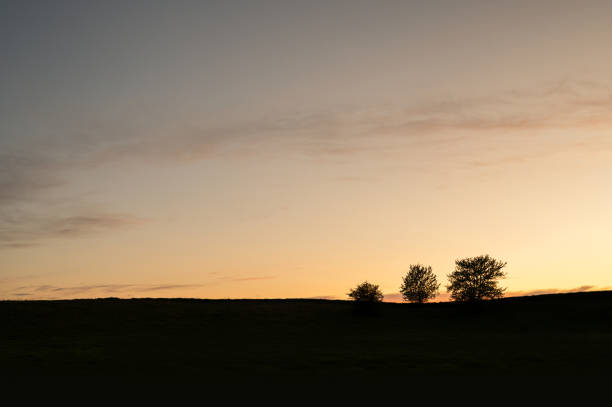istock landscape and contrasting sunset from the late horizon 1487121631
