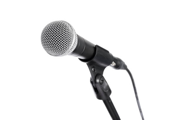 istock close side view of a profosssionnal microphone isolated on white background 1487131248