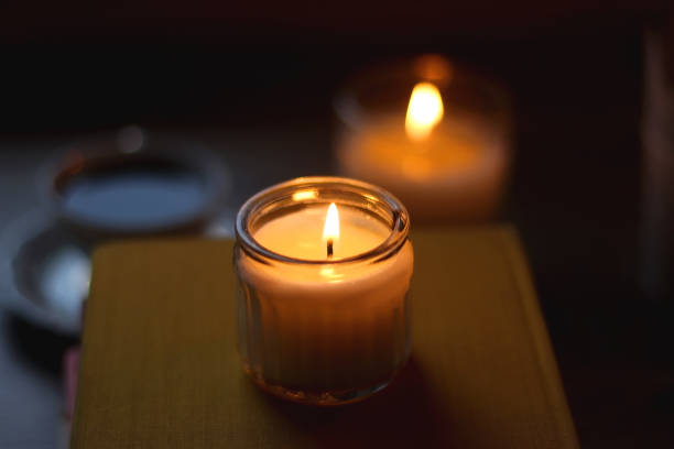 istock Books, Glasses, E-Reader, Pen, Tea, Cookies and Candles 1487131915