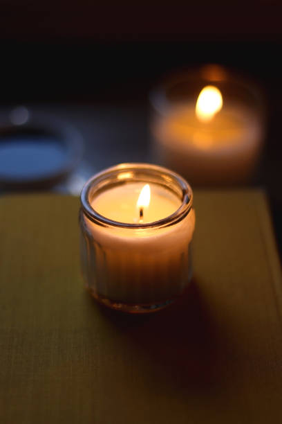 istock Books, Glasses, E-Reader, Pen, Tea, Cookies and Candles 1487131916