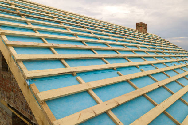 istock Brick house with wooden roof frame under construction. 1487133334