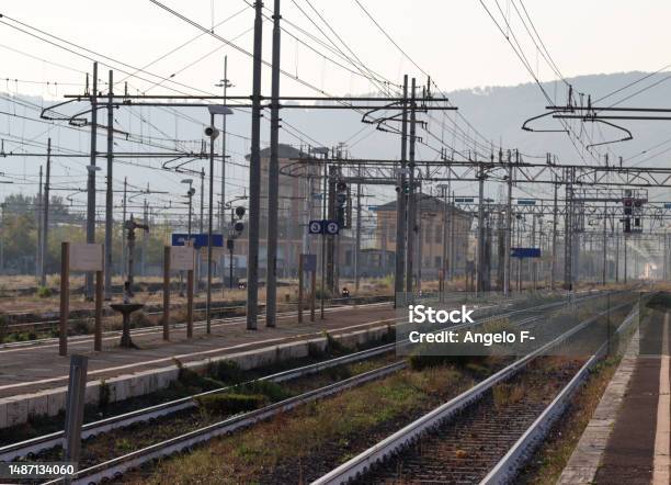 Railway Station Of An Italian City With Travelers Travelers Stock Photo - Download Image Now