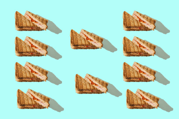 istock Toasted sandwiches on cyan background 1487134670