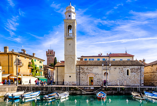 Lazise, Italy - April 26: historic buildings at the old town and port of Lazise on April 26, 2023