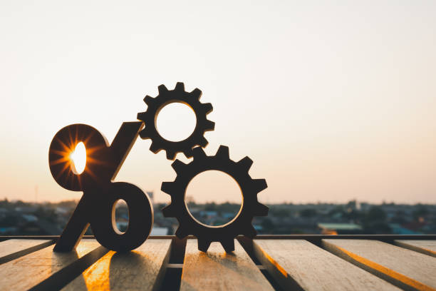 istock Percentage model and gear model with evening sky Key concepts for success, methods, systems of raising or lowering Fed interest rates to correct inflation concepts. 1487136293