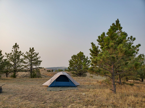 This is a photograph taken on a mobile phone outdoors of tent camping in Glendo State Park Wyoming in September of 2020