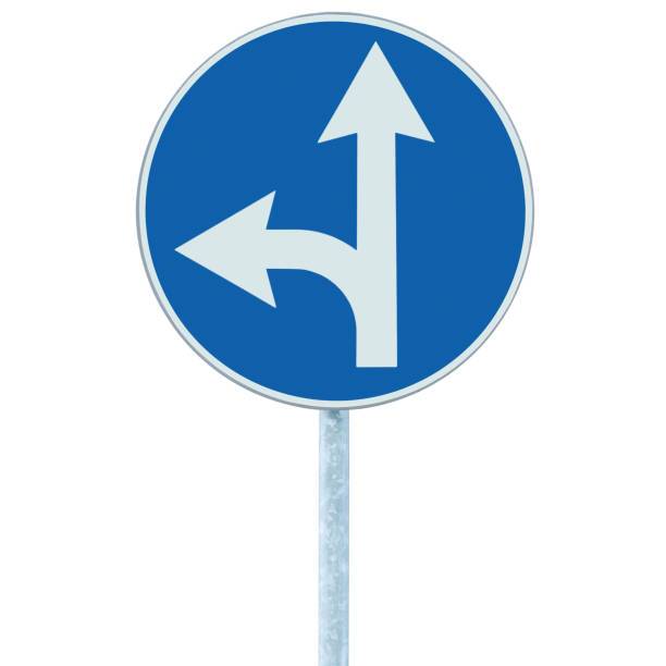 istock Go straight ahead or turn left road sign, blue round isolated roadside mandatory traffic signage, white arrows icon and frame, grey pole post, large detailed vertical closeup 1487136792
