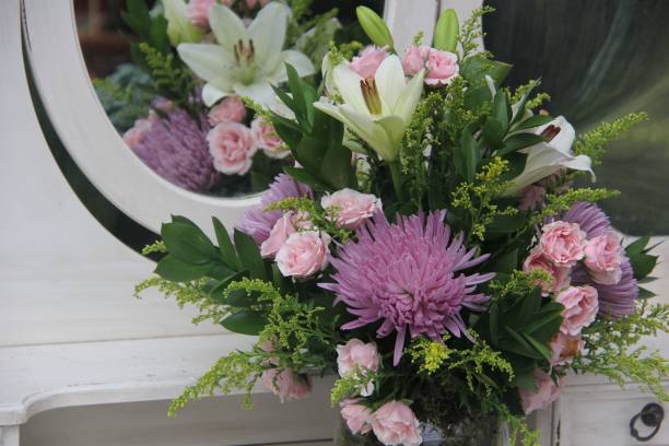 istock a beautiful flower bouquet in front of a mirror 1487138829