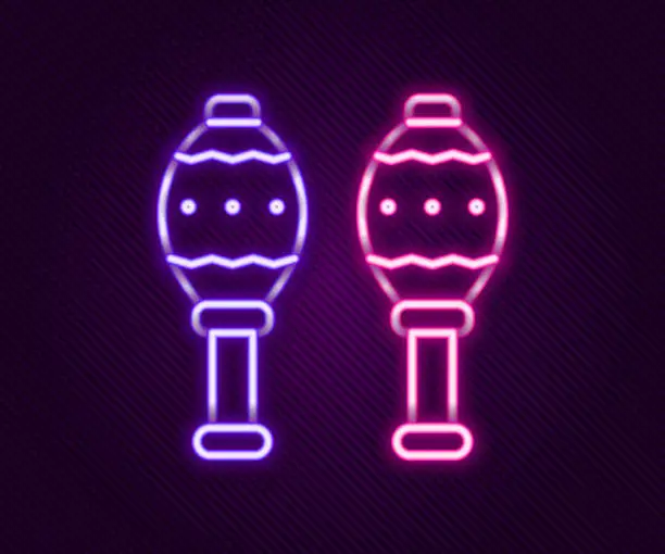 Vector illustration of Glowing neon line Maracas icon isolated on black background. Music maracas instrument mexico. Colorful outline concept. Vector