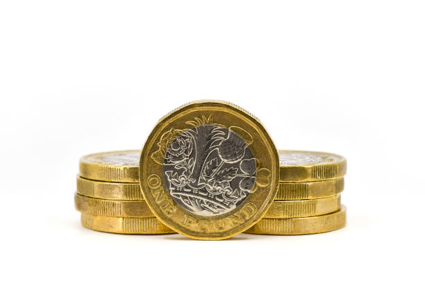 istock British one pound coins isolated against a plain white background 1487140925