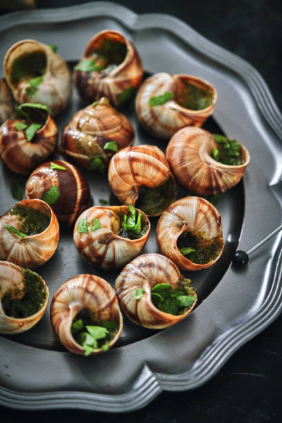istock French Escargot Snails with Herb Butter 1487141207