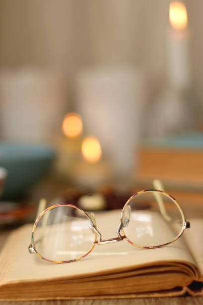 istock Books, Glasses, Tablet, Tea, Chocolate, Cookies and Candles 1487141400