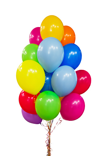 Holiday attributes: A large bunch of multi-colored inflated balloons with ribbons, isolated on a white background