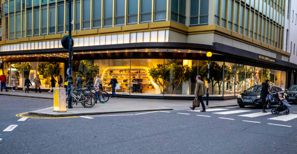 Various views showing the vibrancy of Sloane Square in London, England.  Sloane Square has many shops, restaurants, and the Royal Court Theatre.  It is a popular meeting spot for tourists and residents alike.