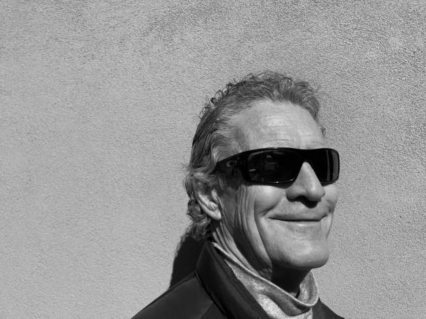 istock Senior Smiling Man in Sunglasses Close-Up 1487145416