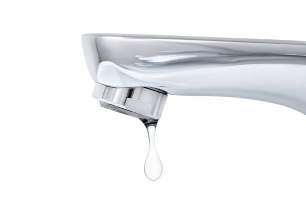 istock faucet with a falling drop of water 1487145705