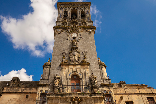 Bell Tower of the Basilica de Santa Maria in the Plaza del Cabildo, Arcos de la Frontera, Andalucia, Spain